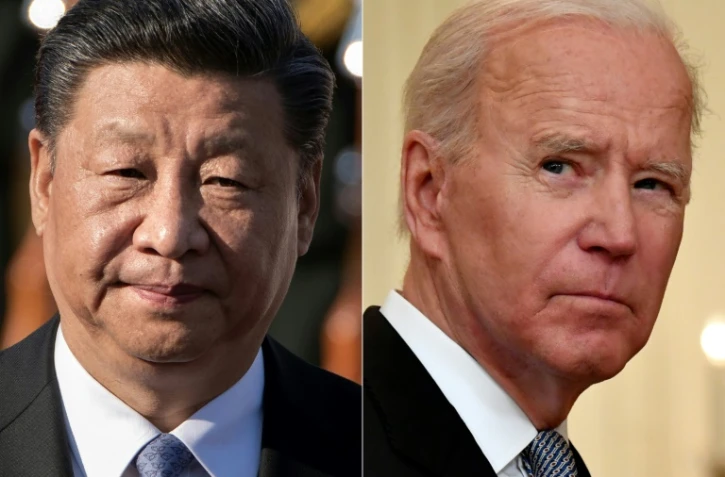 Les présidents chinois Xi Jinping (à Pékin
