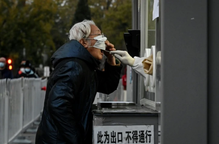 Chine: nouveau record de cas Covid, sur fond de grogne de la population